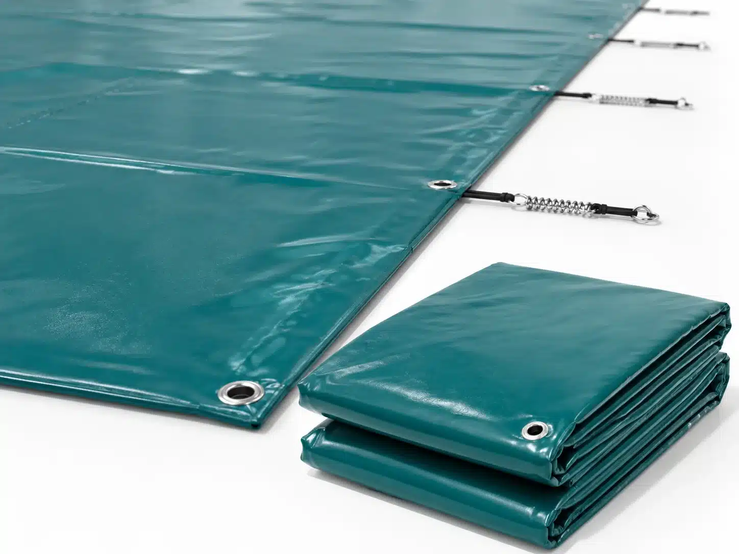 Lona de invierno piscina verde calidad plus plegada con muelles anclaje inox